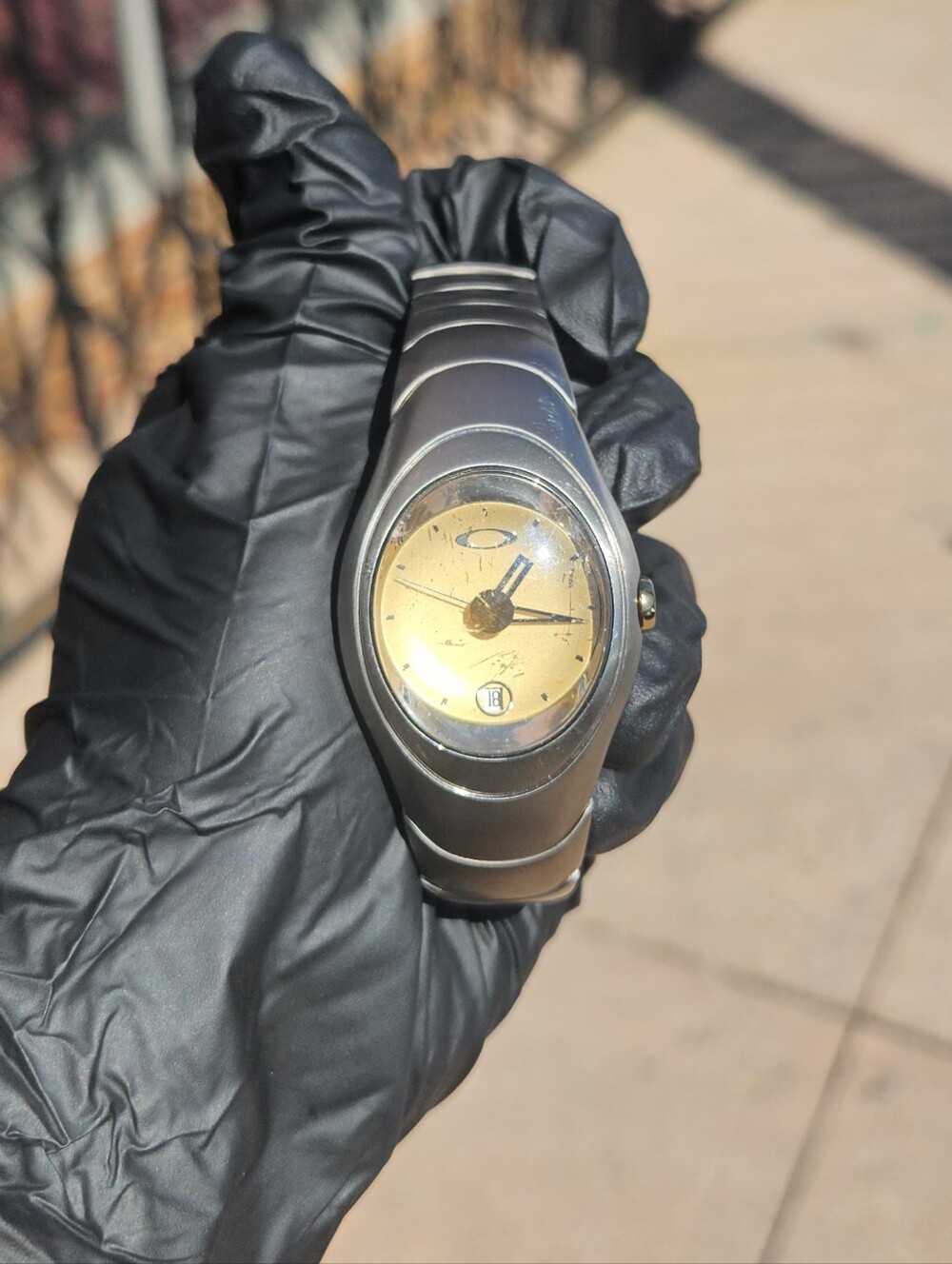 Oakley Timebomb Icon Titanium Watch with Gold Dial.